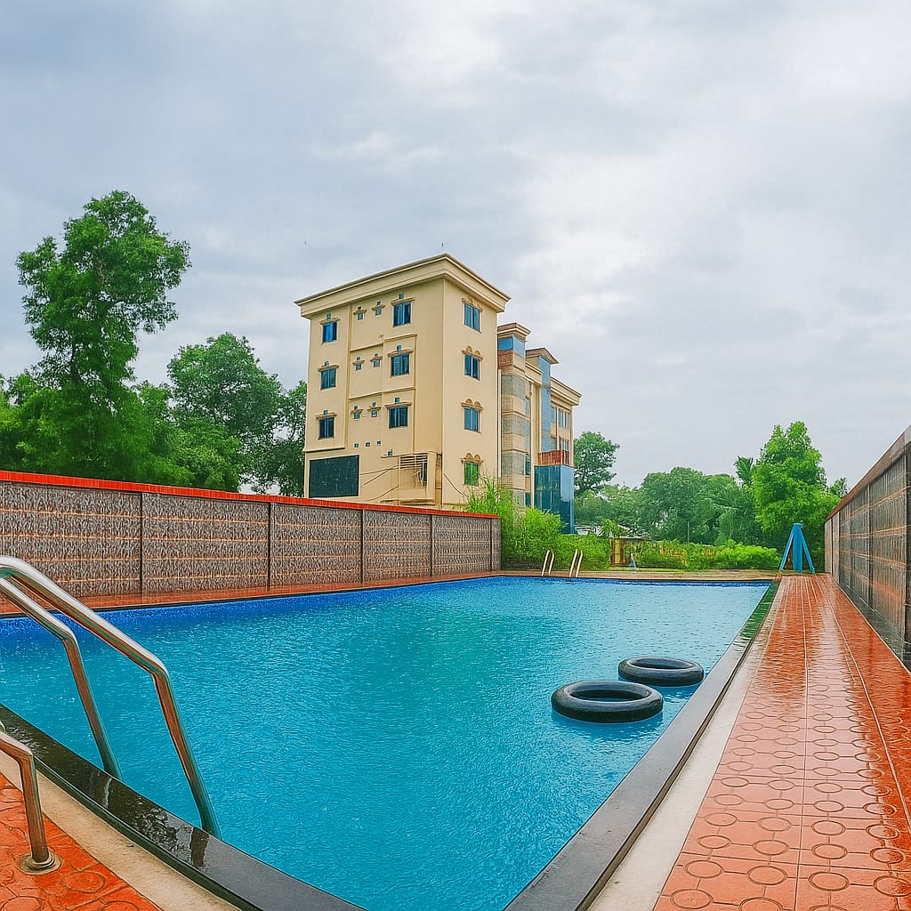 Outdoor swimming pool surrounded by tropical gardens
